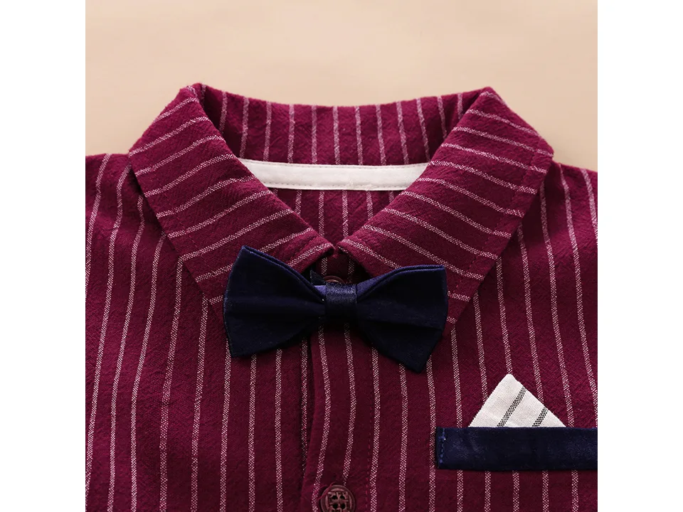 Close-up of the maroon striped baby romper collar with a navy blue bow tie.
