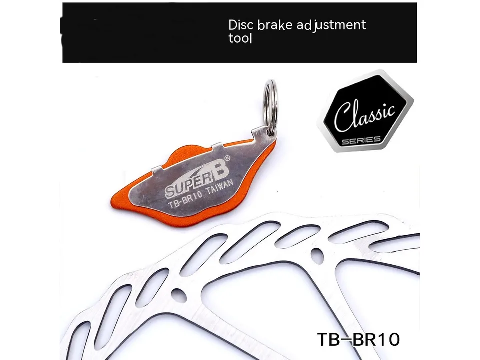 Super B disc brake alignment tool positioned on a bicycle brake rotor.