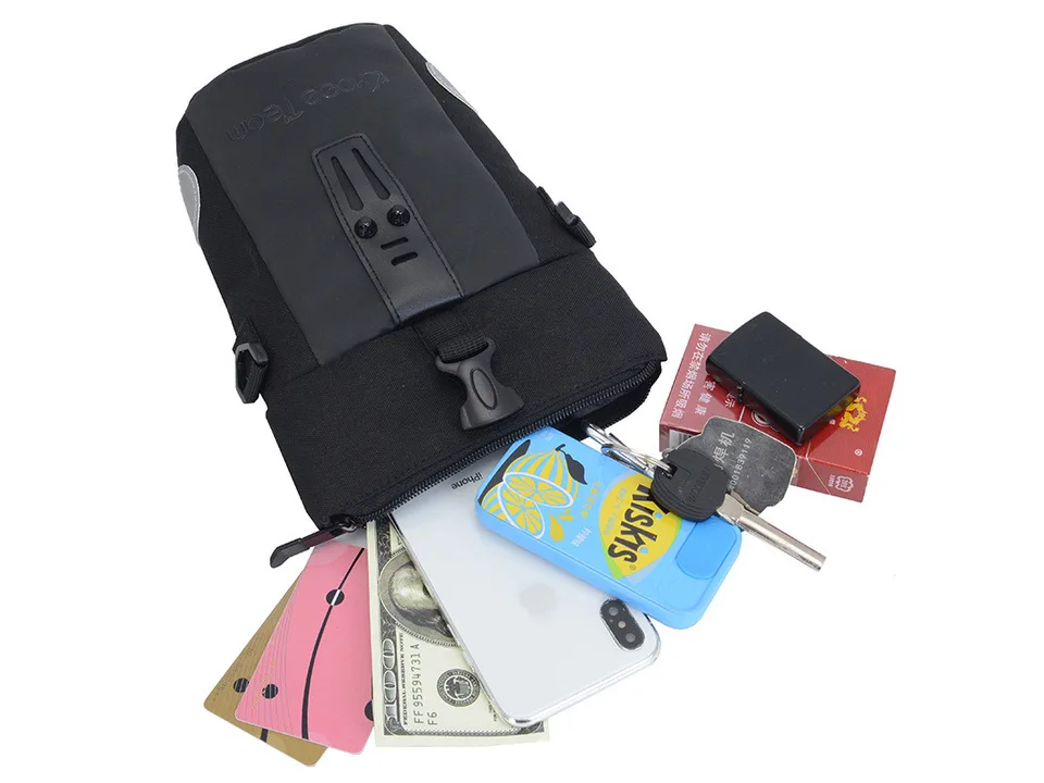 Crossbody bag filled with phone, keys, cards, and other small items