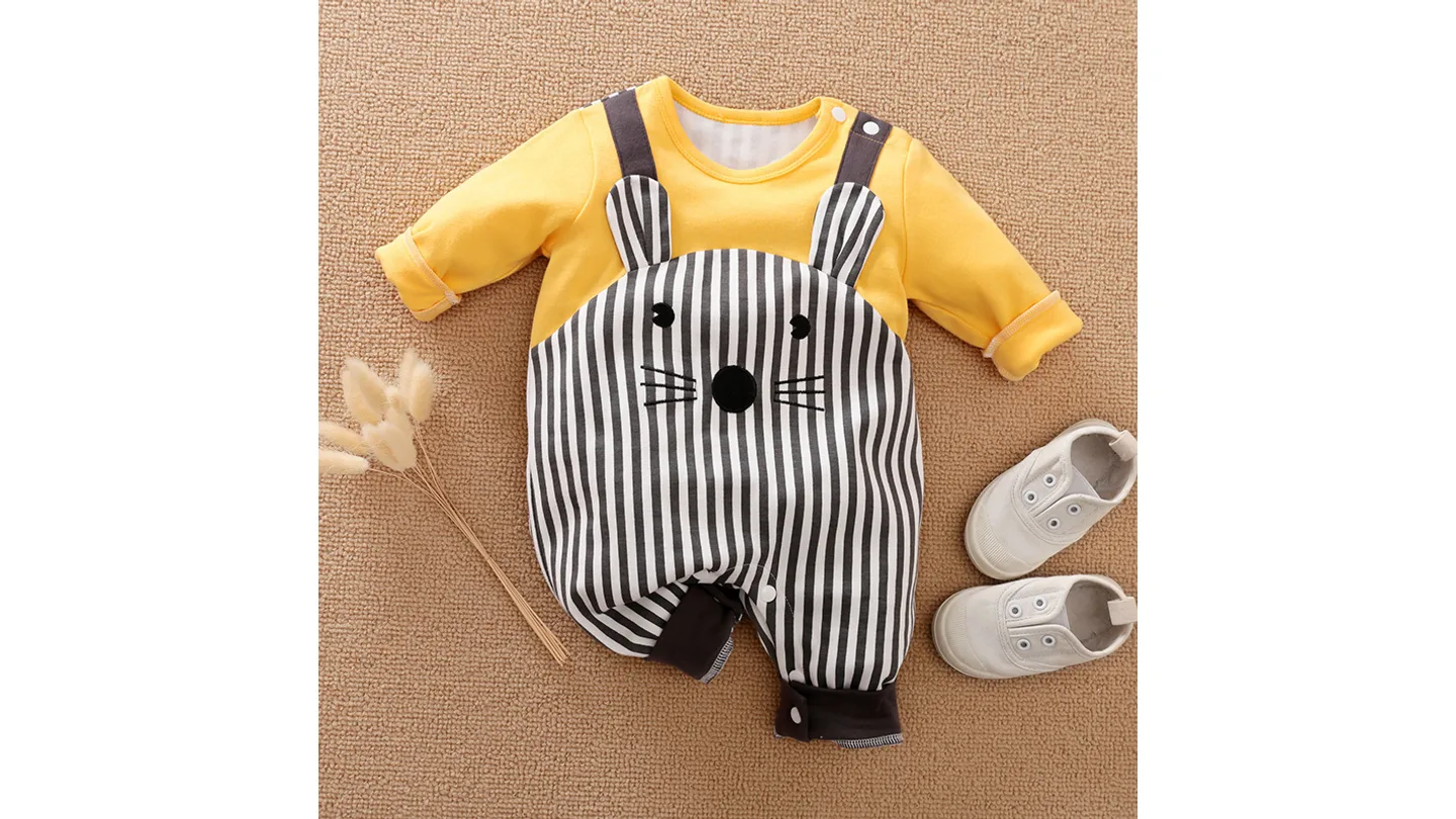 Full view of the yellow and striped baby romper with animal face design, laid flat.