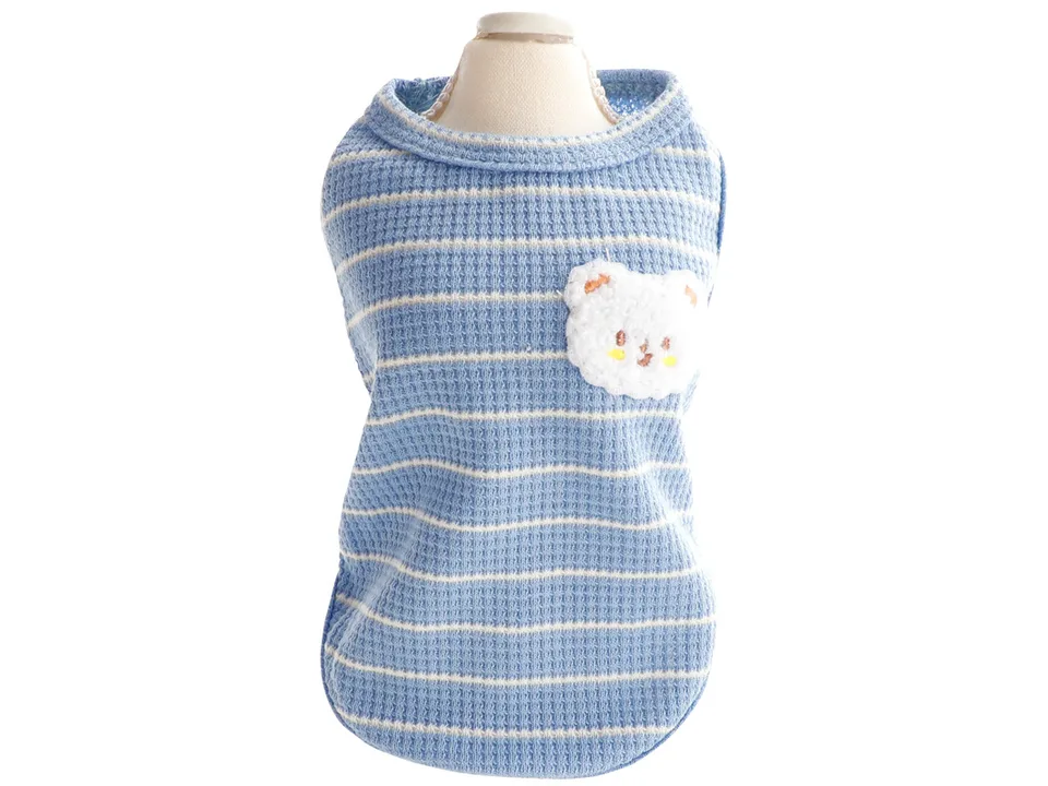 Blue and white striped dog vest with a bear patch on a mannequin.