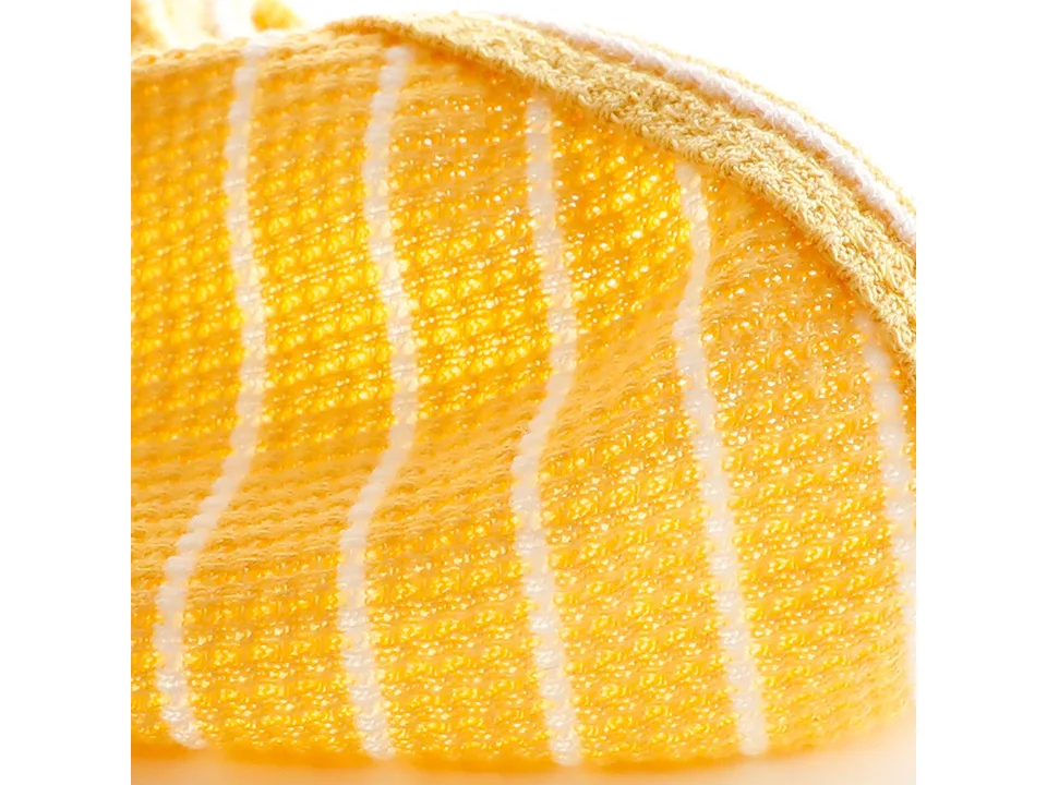 Close-up of the yellow and white striped waffle knit fabric.