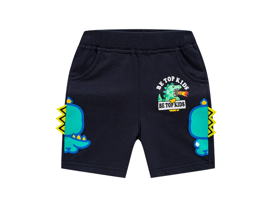 Dark blue boys' shorts with a dinosaur graphic and yellow spikes on the sides.