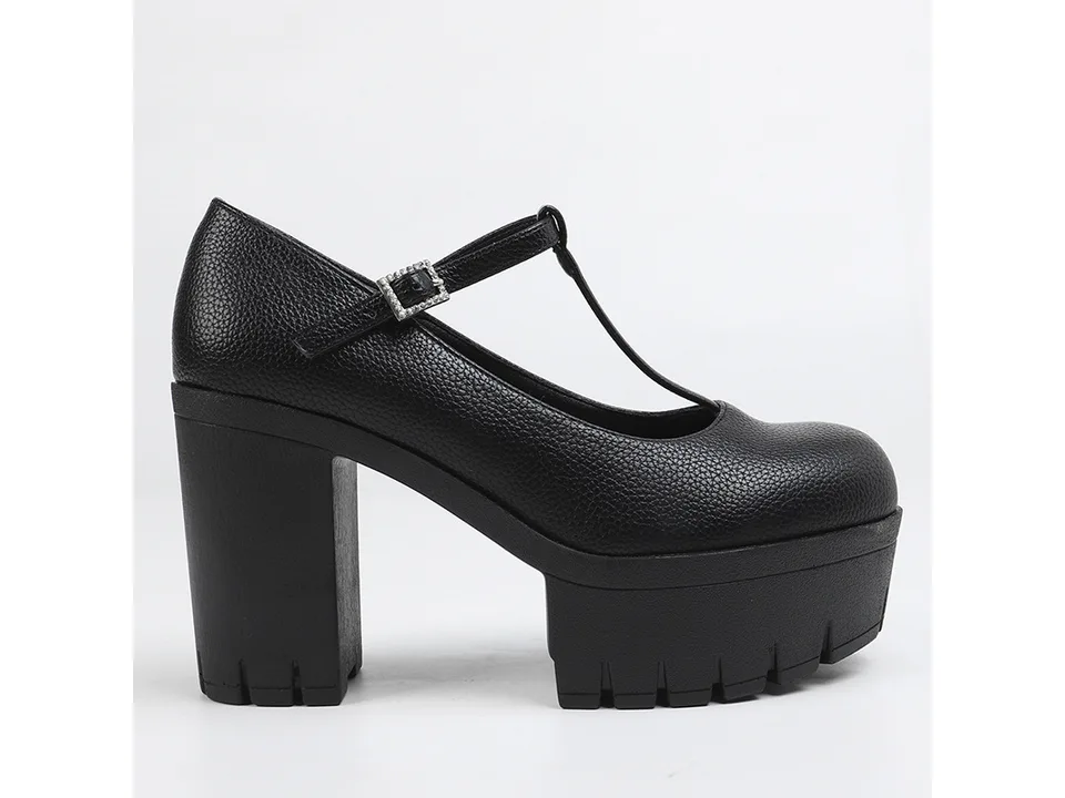 Side view of a black T-strap platform heel.