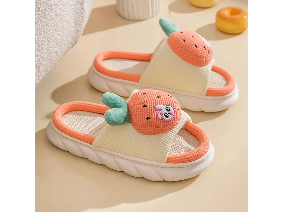 A pair of orange fruit-themed slippers with a thick sole and open toe.