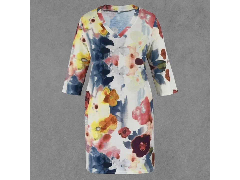A floral print V-neck mini dress with half sleeves displayed on a flat surface.
