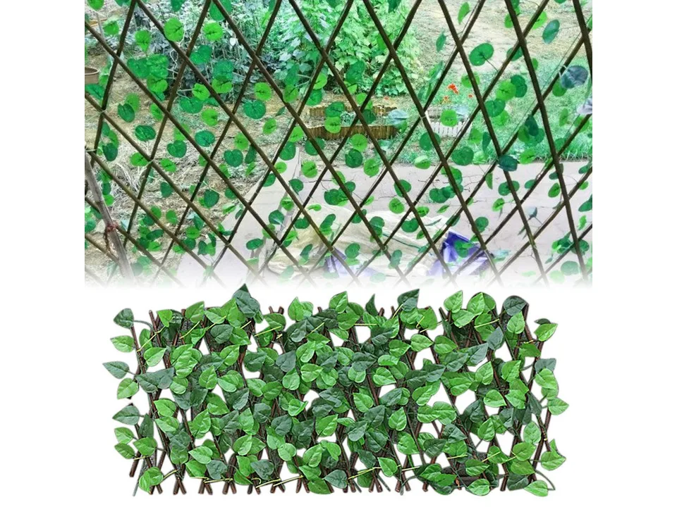 Retractable garden fence with artificial green leaves installed on a lattice frame.