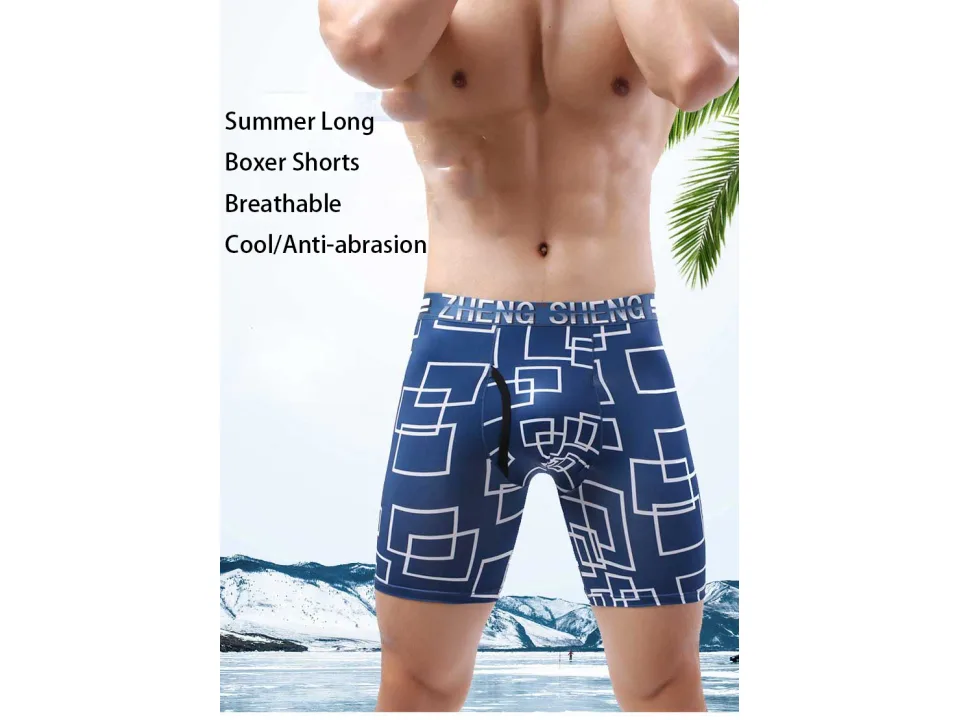 A man wearing blue patterned long boxer briefs.
