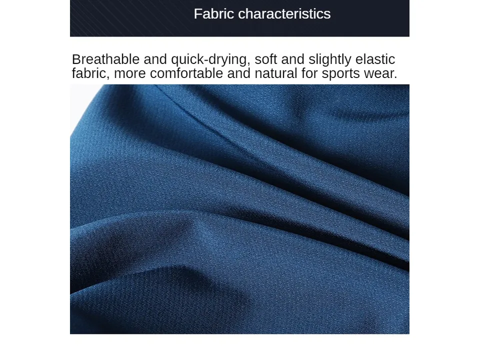 Close-up view of the blue, slightly elastic fabric of the shorts.