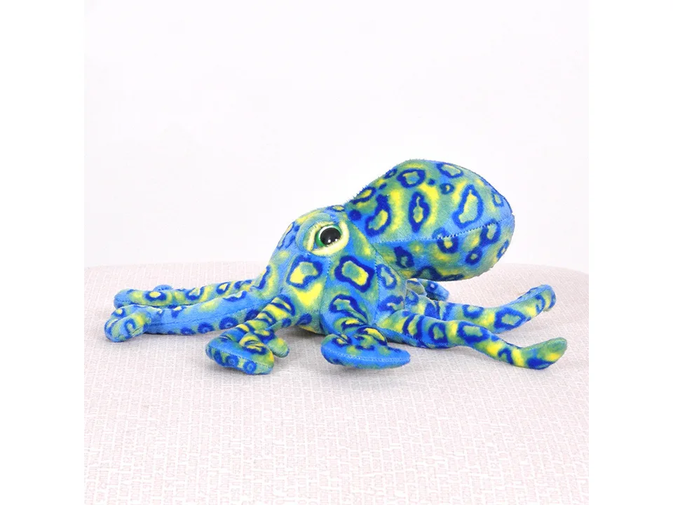 Blue leopard print octopus plush toy viewed from the side.