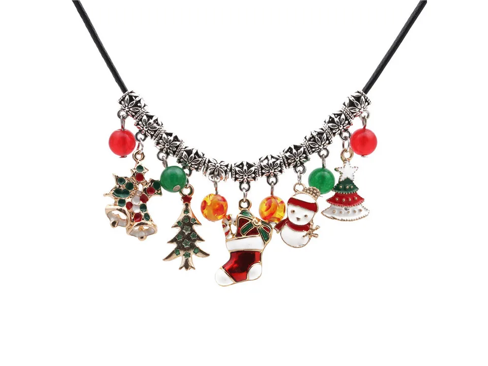 Close-up of the Christmas charm necklace featuring various festive pendants.