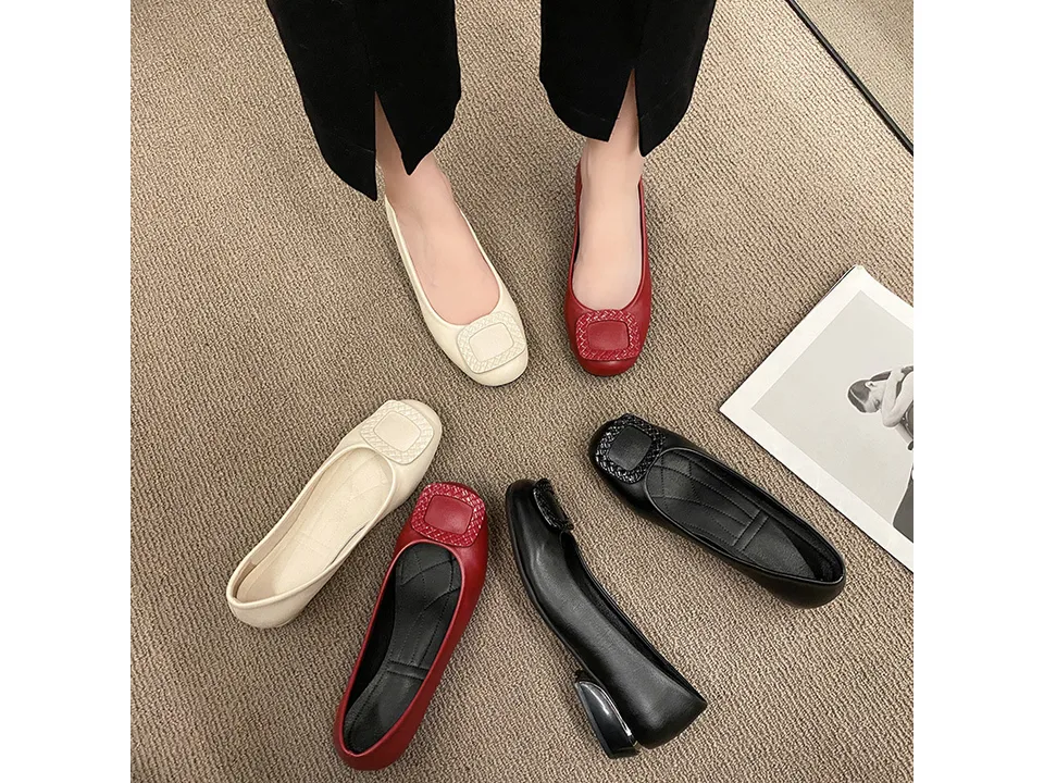 Three pairs of women's low heel pumps in beige, red, and black, arranged on a floor.
