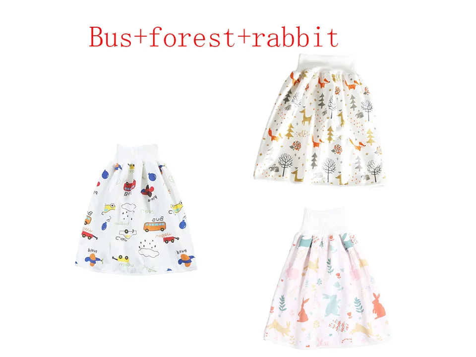 Three baby diaper skirts with bus, forest, and rabbit patterns.