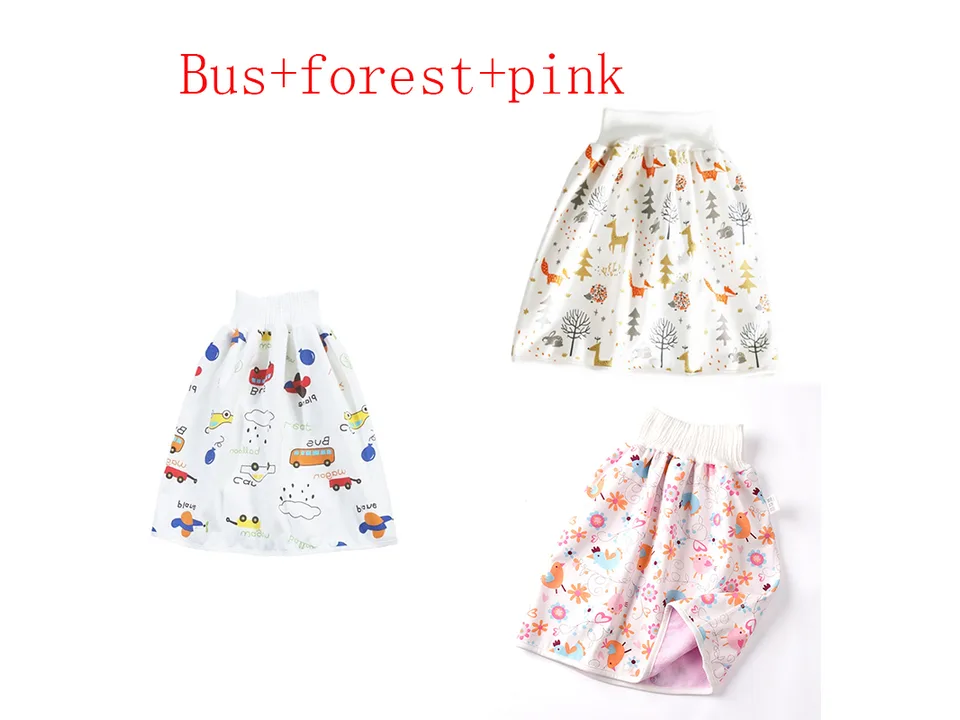 Three baby diaper skirts with bus, forest, and pink bird patterns.