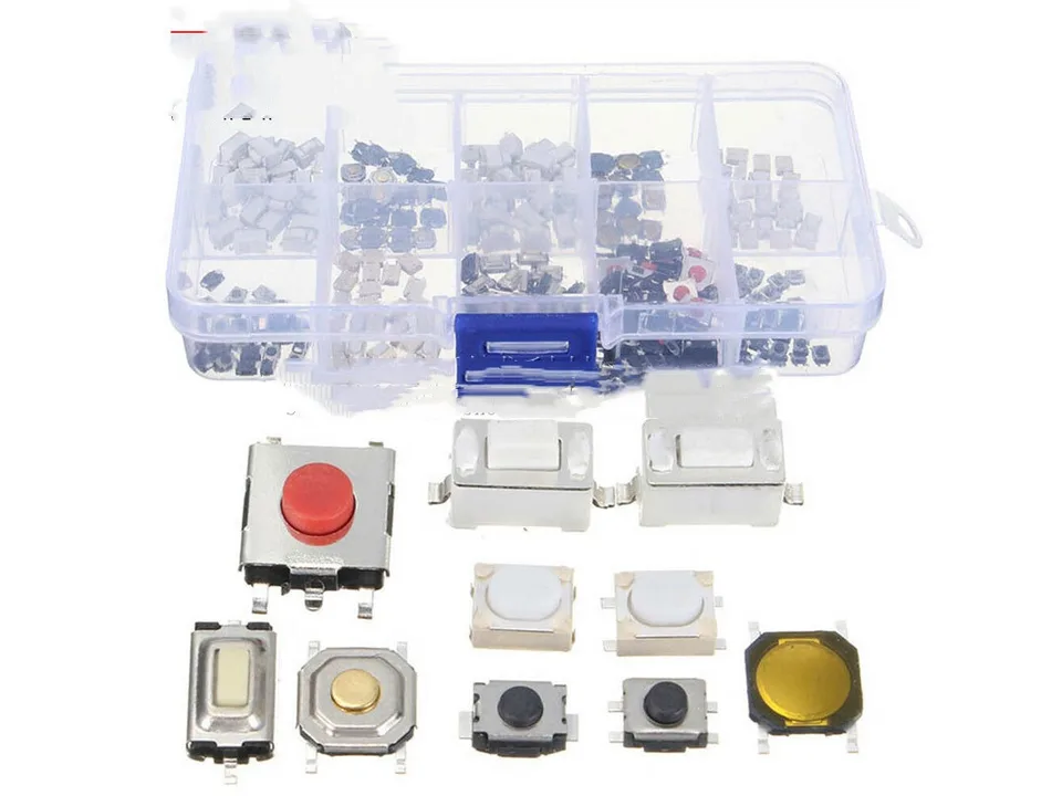 Close-up view of various electronic tactile push button switches from the assortment kit.