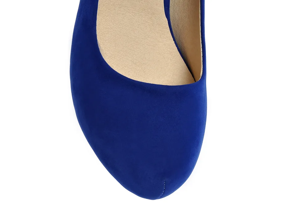 Close-up of the top view of a blue suede pump.