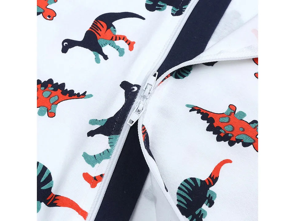 Close-up of the zipper closure on the baby romper.