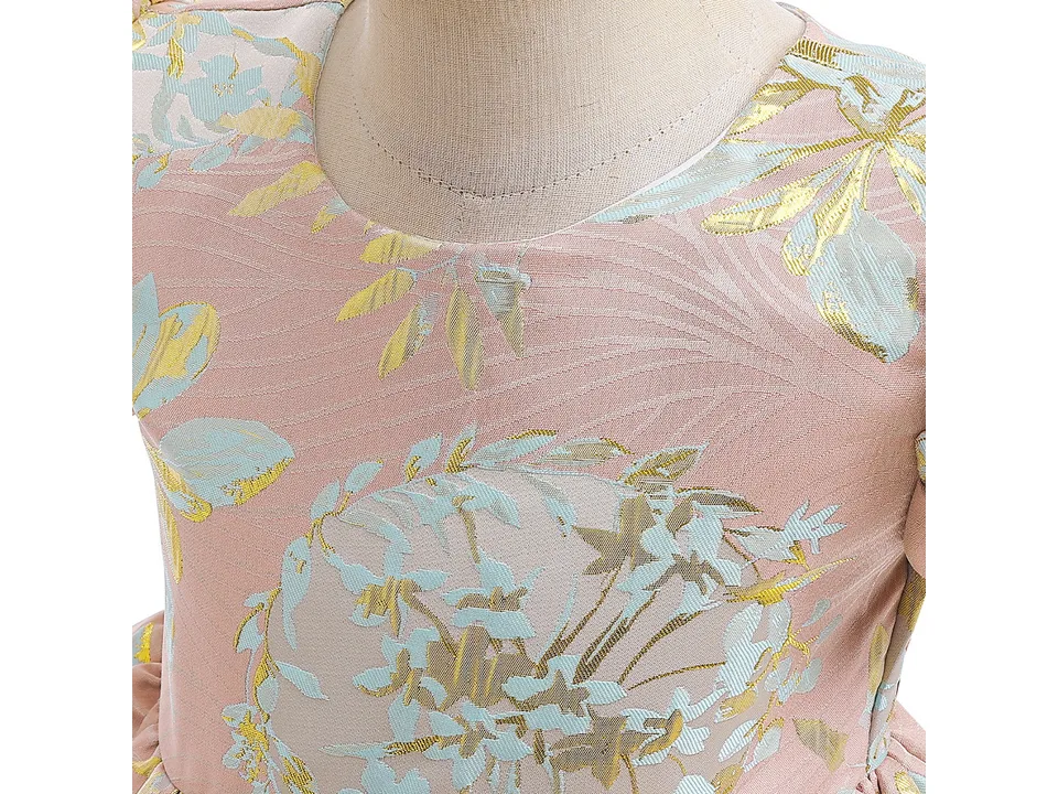 Close-up of the bodice and neckline of the pink floral dress.