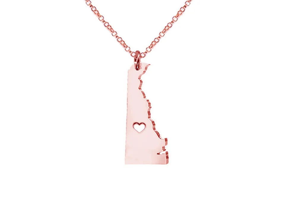 Rose gold Delaware state map pendant necklace with a heart cutout.