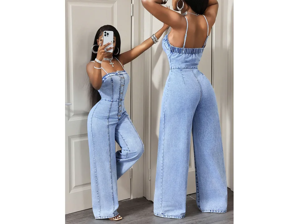 A woman posing in a mirror, showing both the front and back view of a light blue denim jumpsuit.