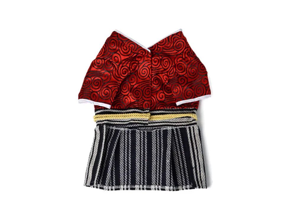 The red and black Japanese-style samurai costume for pets laid flat on a white background.