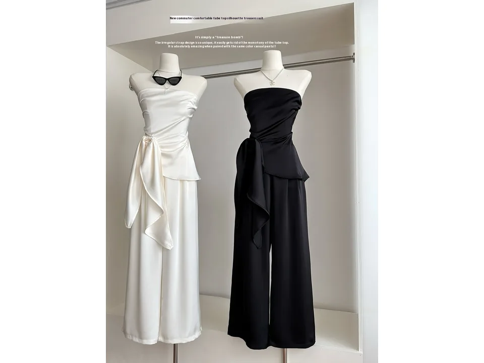 White and black tube top and wide leg trouser sets on mannequins