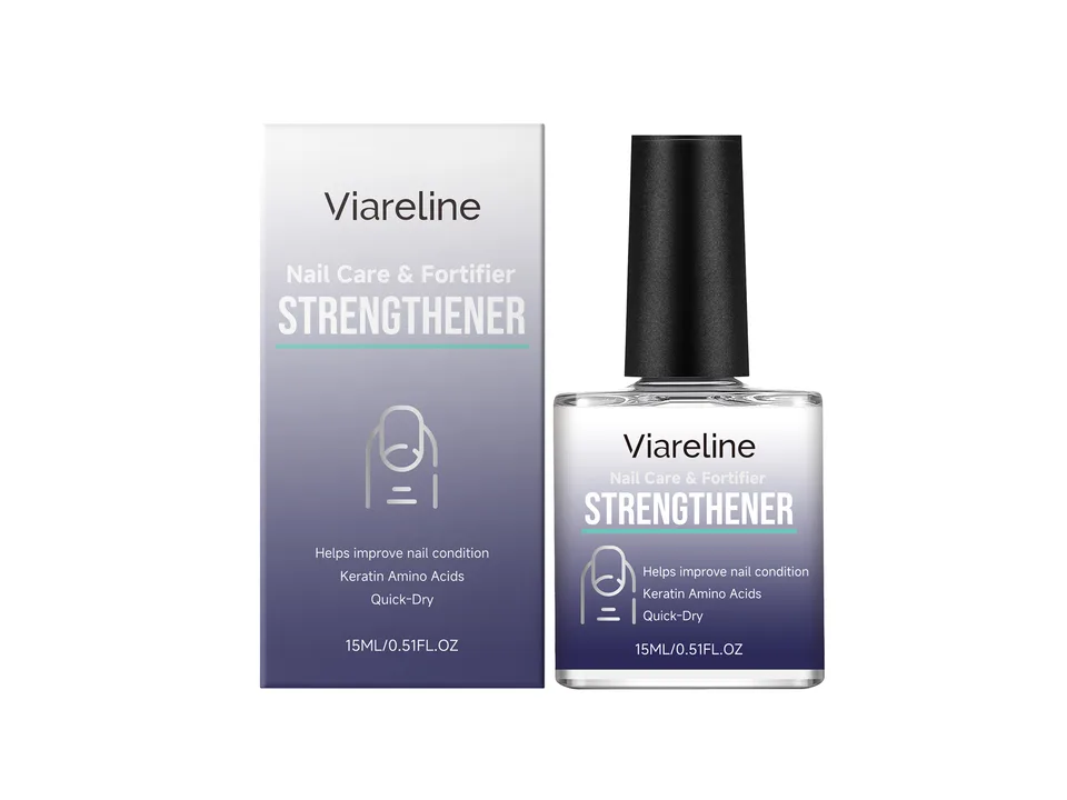 Bottle of Viareline nail strengthener next to its product box.