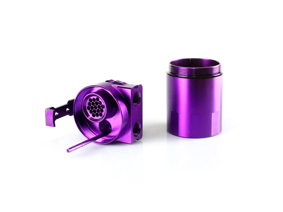 Internal view of the oil catch can showing the filter and baffle design.