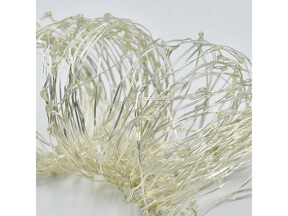 Close-up of copper wire string lights showing individual LED bulbs.
