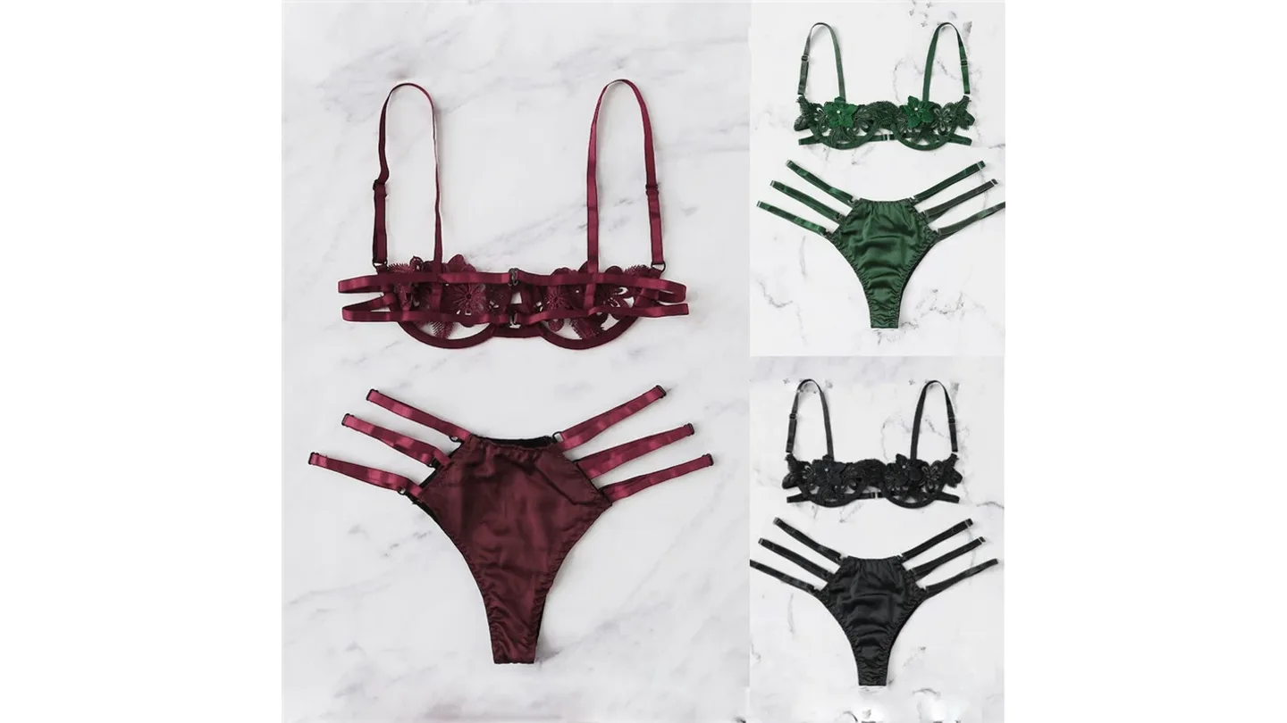 Three lingerie sets in burgundy, green, and black, each featuring a floral lace bra and strappy panty.